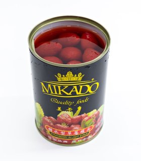 premium canned strawberry packed in glass jars and printed tins