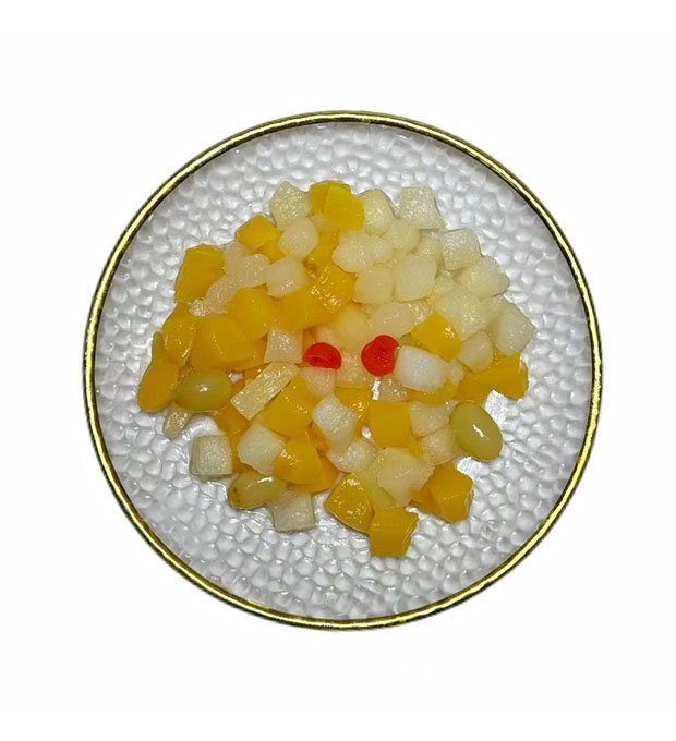 mixed fruit cocktail with cherry and peach