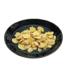 sliced mushrooms in clear brine