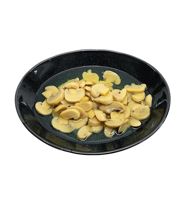 sliced mushrooms in clear brine