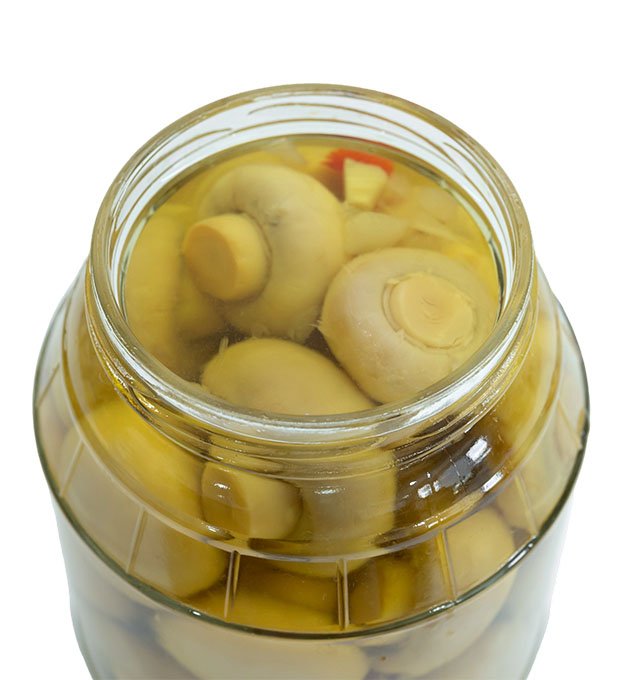 canned mushroom mix in vinegar brine