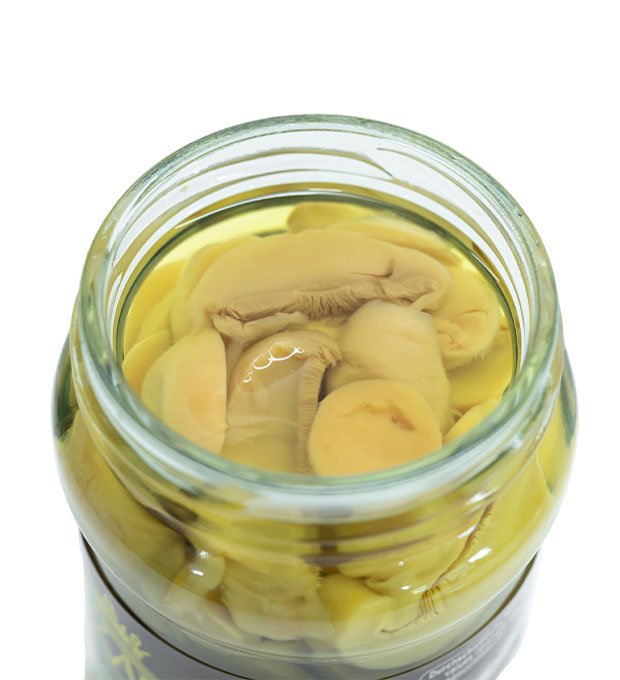 glass jars of sliced mushrooms for retail