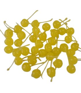 yellow cherries arranged neatly on dish