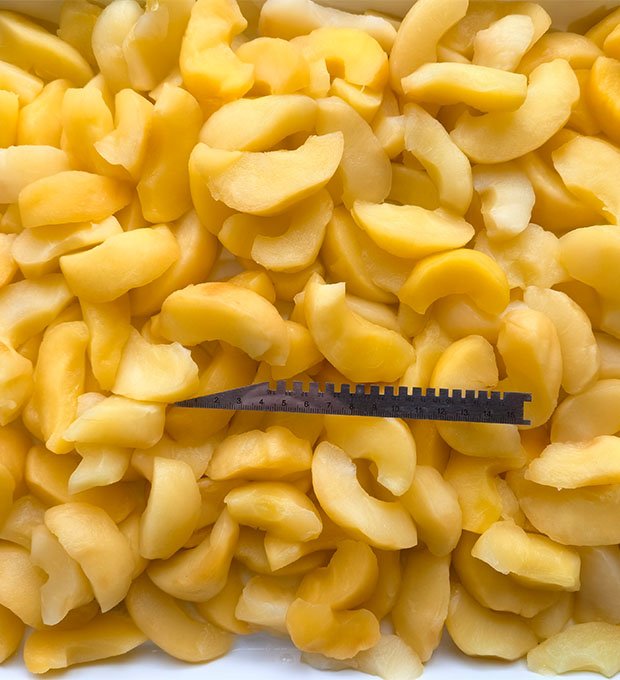 fresh apple pieces preserved in syrup
